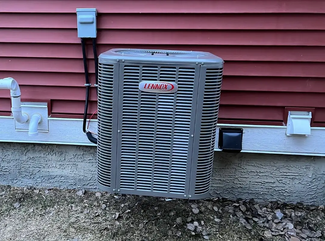 New Lennox air conditioner installed outside Chestermere residence by Comfort Union